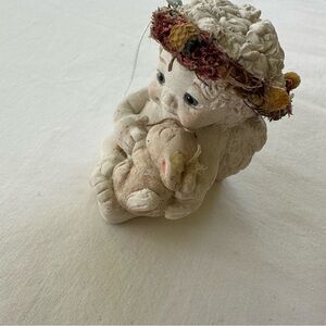 Adorable Angel Figurine with Floral Accents